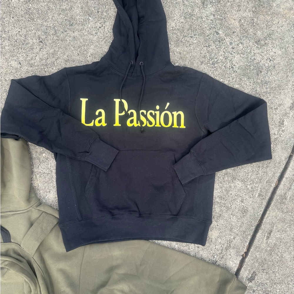 Black Hoodie with Yellow 'La Pasión' Print